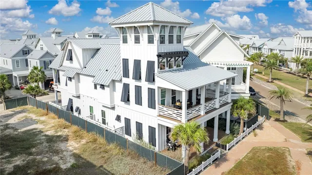 a view of a large building with a swimming pool