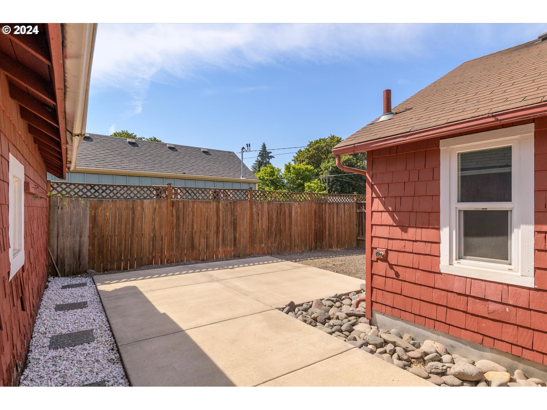 91019 South Coleman Street Eugene, OR 97408 - Photo 15 of 29 a view of backyard with a barbeque and wooden fence