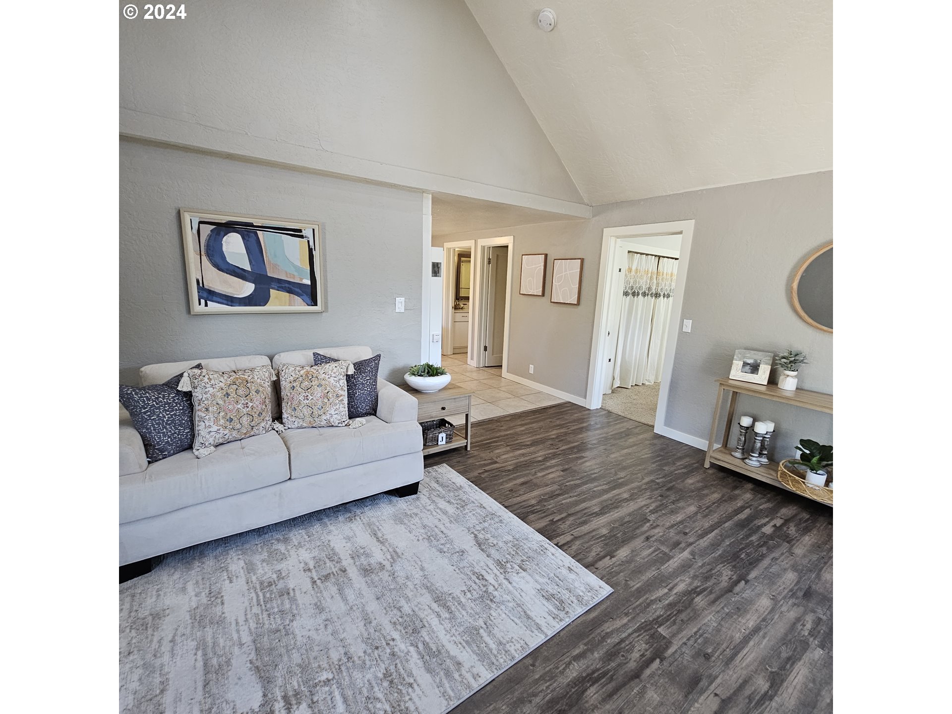 91019 South Coleman Street Eugene, OR 97408 - Photo 3 of 29 a living room with furniture and a wooden floor
