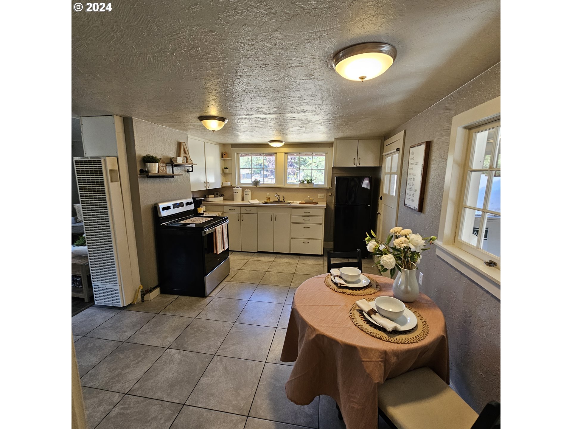 91019 South Coleman Street Eugene, OR 97408 - Photo 7 of 29 a kitchen with a sink appliances and cabinets