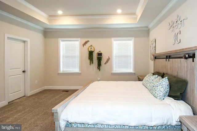 a bathroom with double sink and a mirror