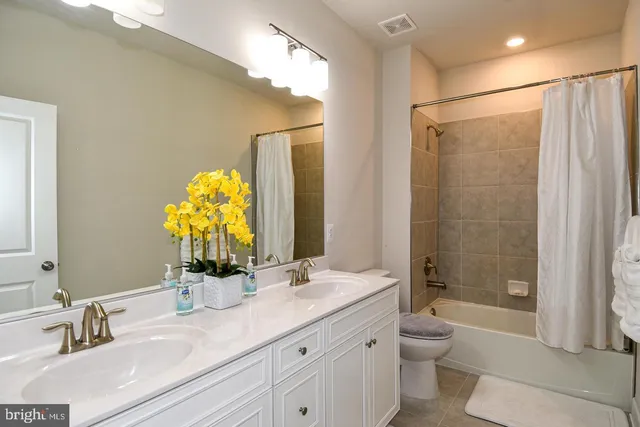 a bathroom with a shower and a bathtub