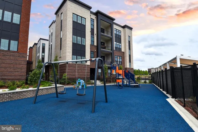 a view of a backyard with sitting area