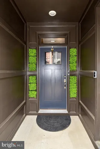 a large kitchen with lots of counter space and stainless steel appliances