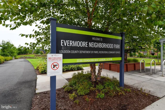 a view of a backyard with sitting area