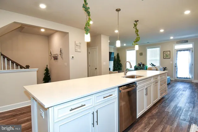 a kitchen with a stove and cabinets