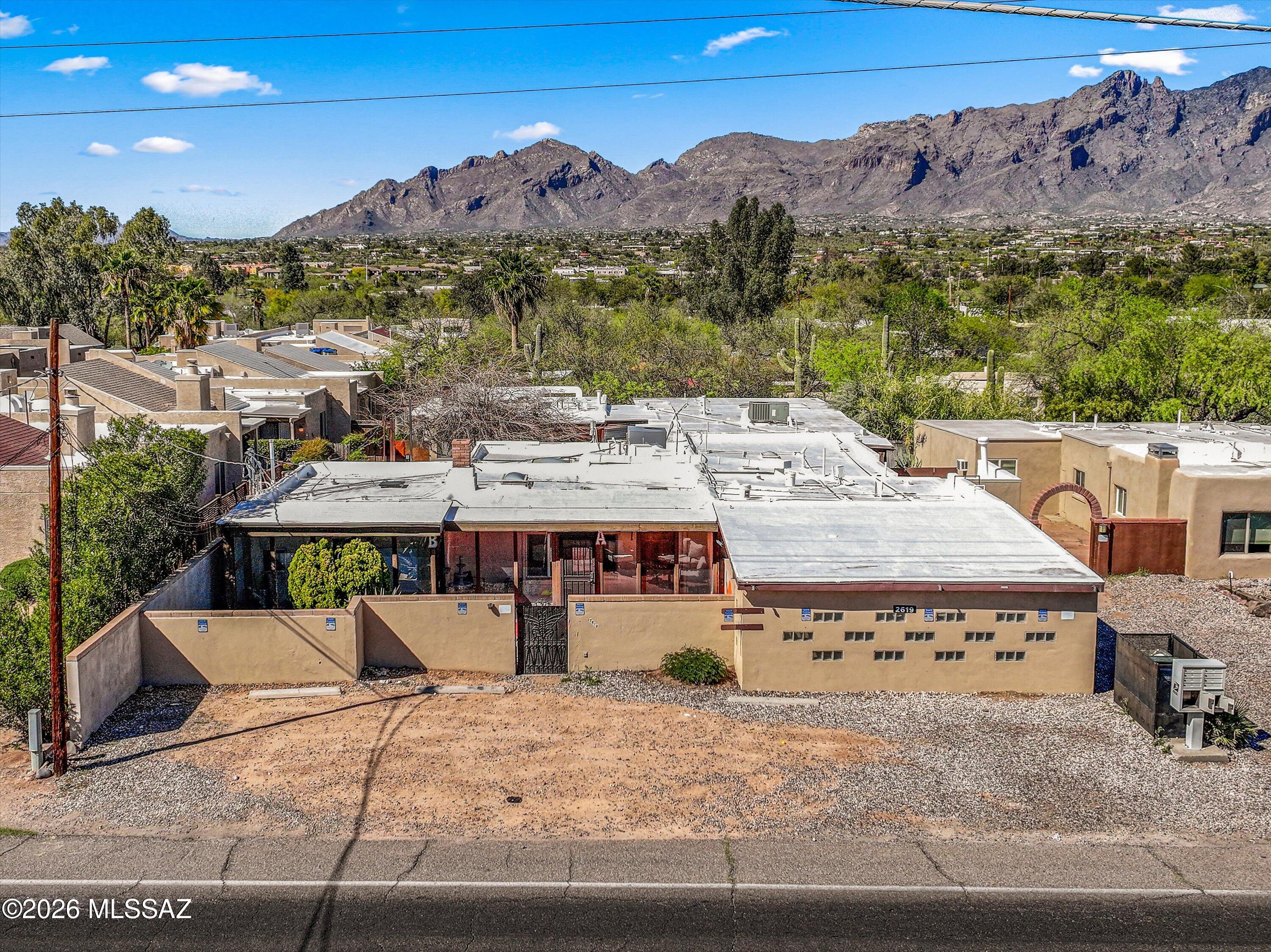 2619 East Prince Road Tucson, AZ 85716 - Photo 6 of 50 a view of a terrace with a bench