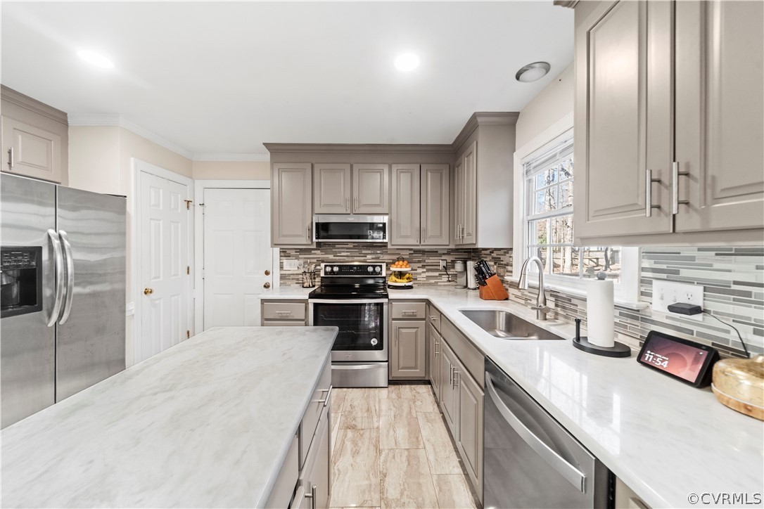 13020 Carters Way Road Chesterfield, VA 23838 - Photo 16 of 49 a kitchen with stainless steel appliances a refrigerator sink and cabinets