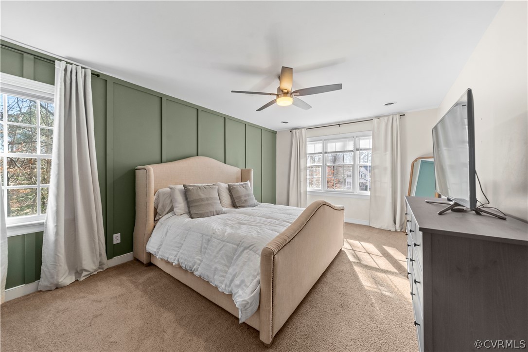 13020 Carters Way Road Chesterfield, VA 23838 - Photo 24 of 49 a spacious bedroom with a bed chandelier and a window