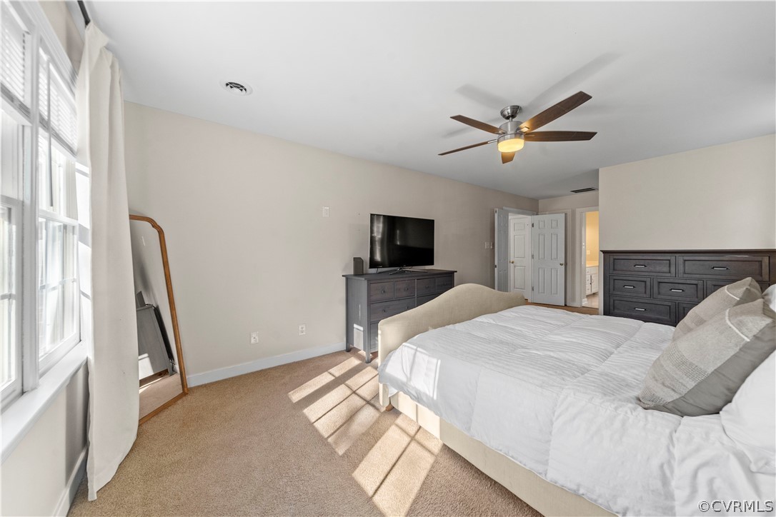 13020 Carters Way Road Chesterfield, VA 23838 - Photo 25 of 49 a bedroom with a bed and a flat screen tv