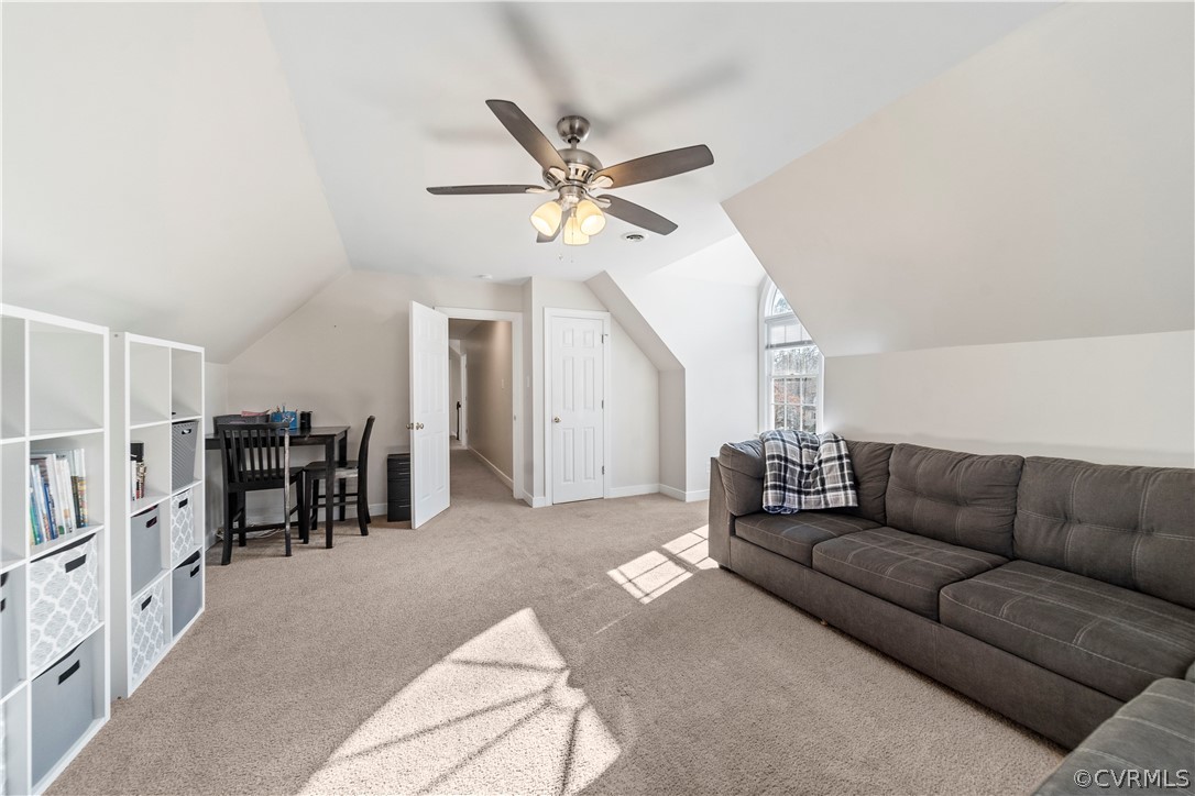 13020 Carters Way Road Chesterfield, VA 23838 - Photo 33 of 49 a living room with furniture a ceiling fan and a rug