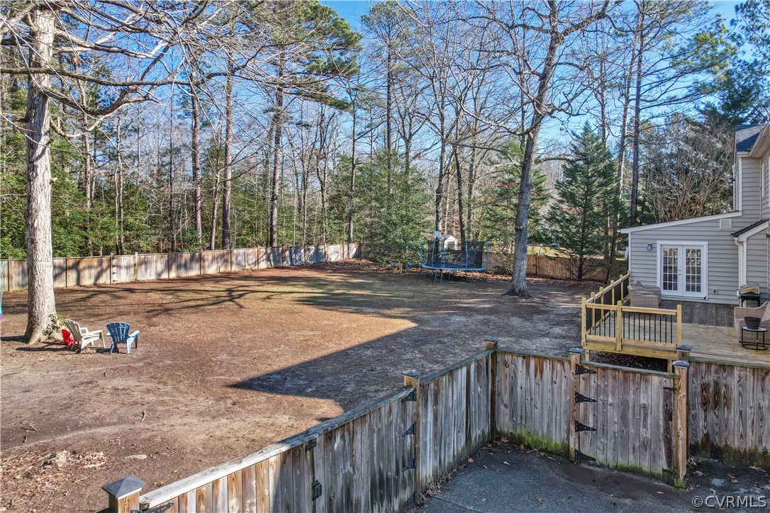 13020 Carters Way Road Chesterfield, VA 23838 - Photo 38 of 49 a view of a backyard with trees