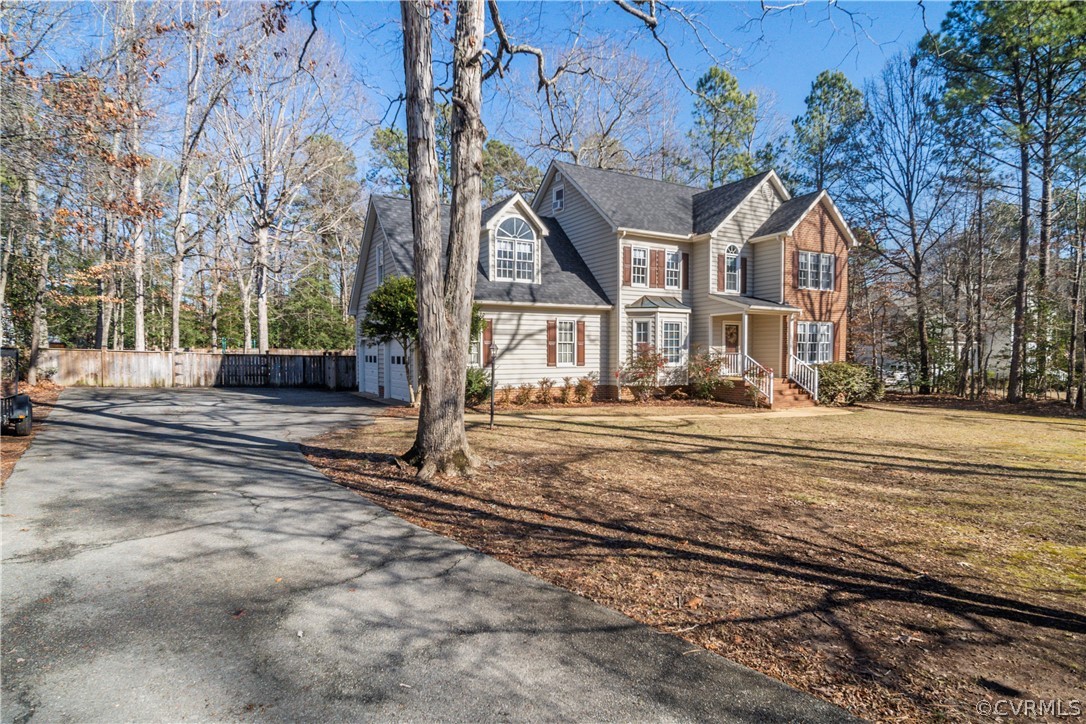 13020 Carters Way Road Chesterfield, VA 23838 - Photo 41 of 49 a front view of a house with a yard