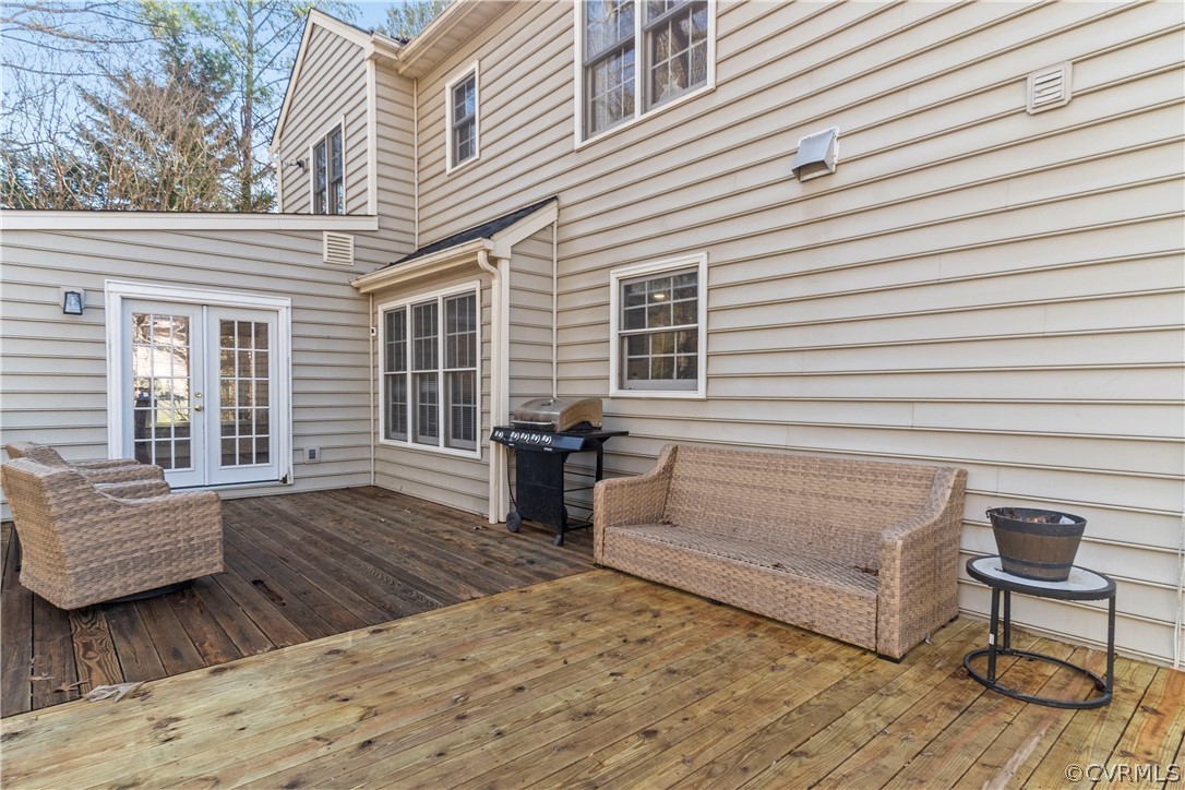 13020 Carters Way Road Chesterfield, VA 23838 - Photo 47 of 49 a view of a deck with chair and wooden floor