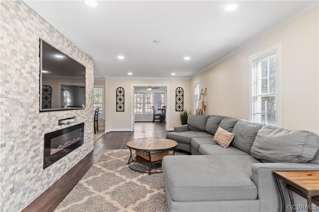 13020 Carters Way Road Chesterfield, VA 23838 - Photo 8 of 49 a living room with furniture a fireplace and a flat screen tv