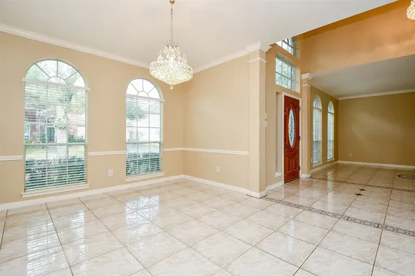 a view of a kitchen with a sink and a fireplace