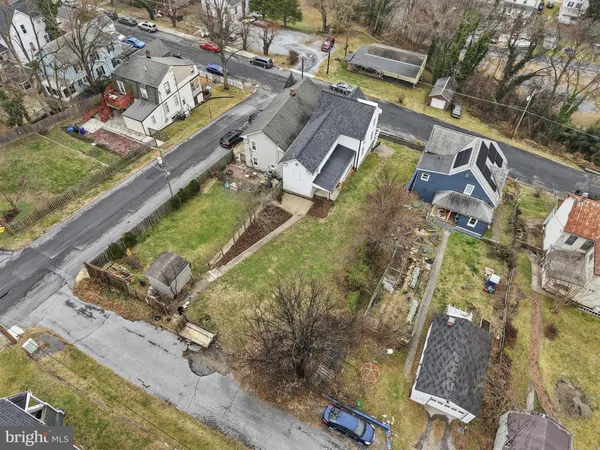 an aerial view of a house with a garden
