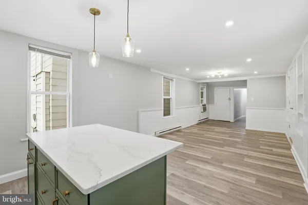 a view of kitchen and windows