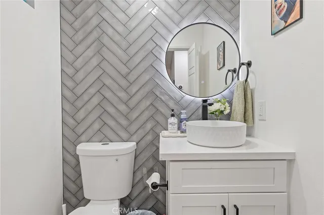 a bathroom with a toilet and a sink