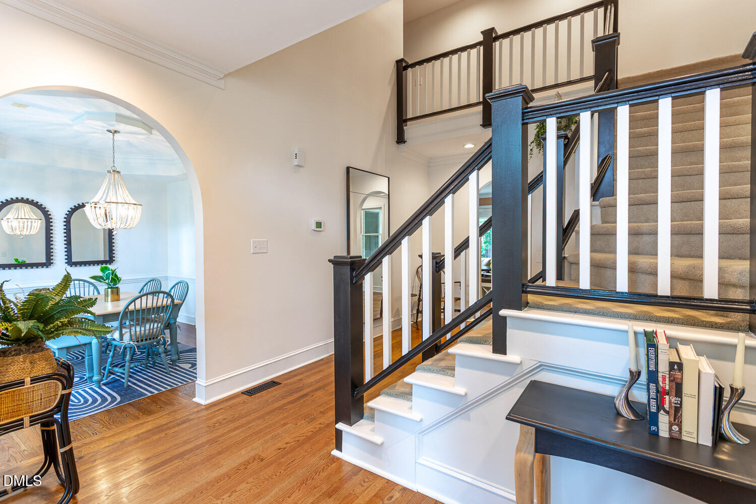 8509 Towneley Place Raleigh, NC 27615 - Photo 4 of 36 a view of entryway and hall with wooden floor