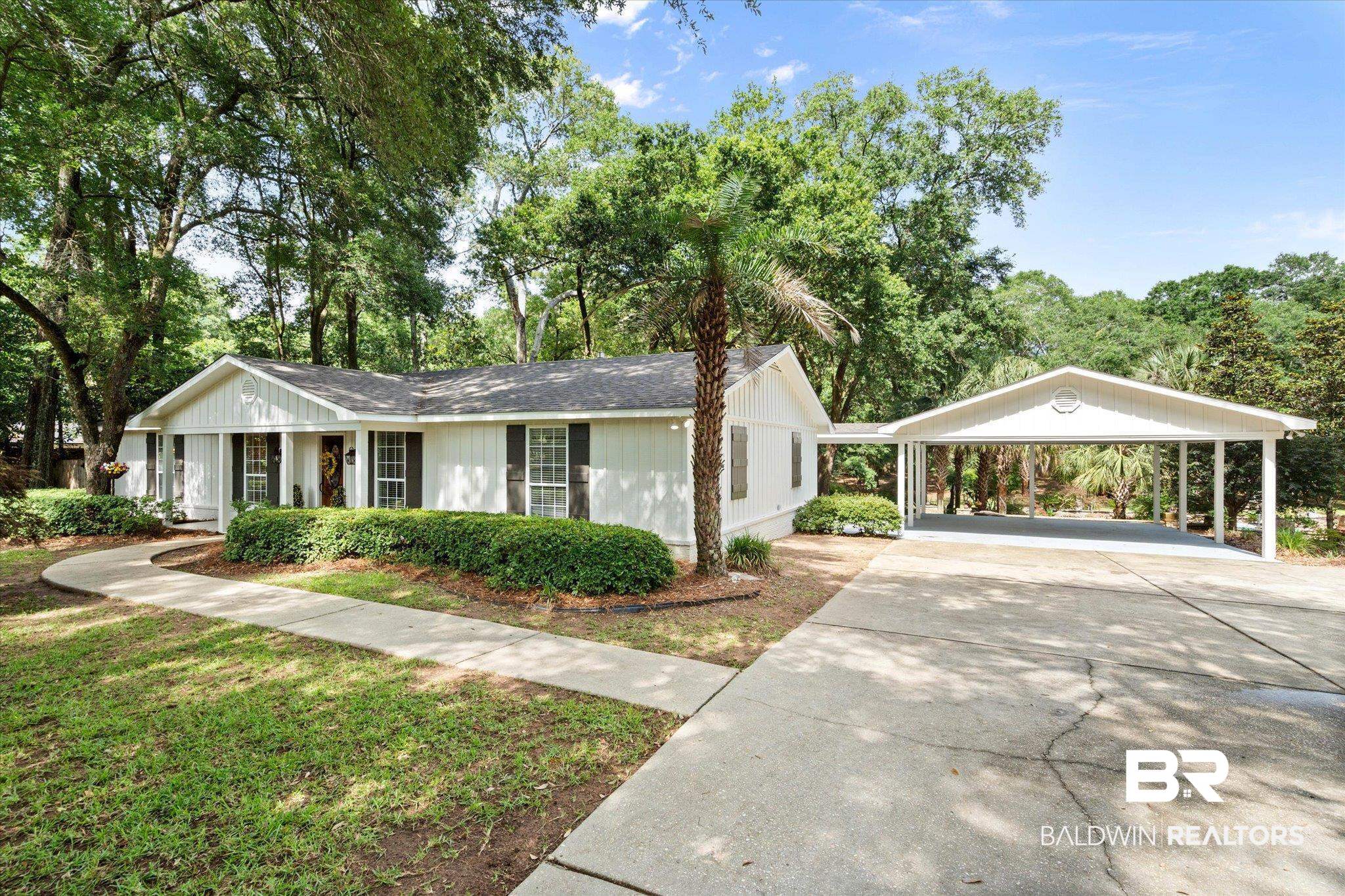 3715 Latigo Road Mobile, AL 36695 - Photo 33 of 39 Ranch-style home featuring driveway and a carport