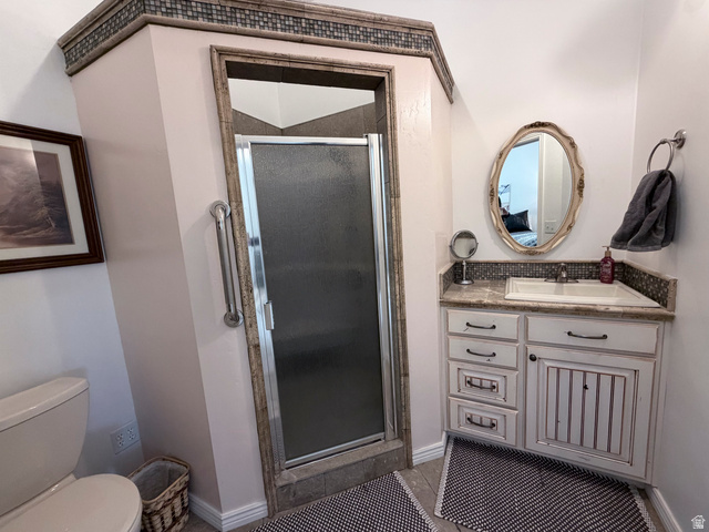 2855 South 1000 West Perry, UT 84302 - Photo 107 of 142 Bathroom with vanity, a stall shower, and light tile patterned floors