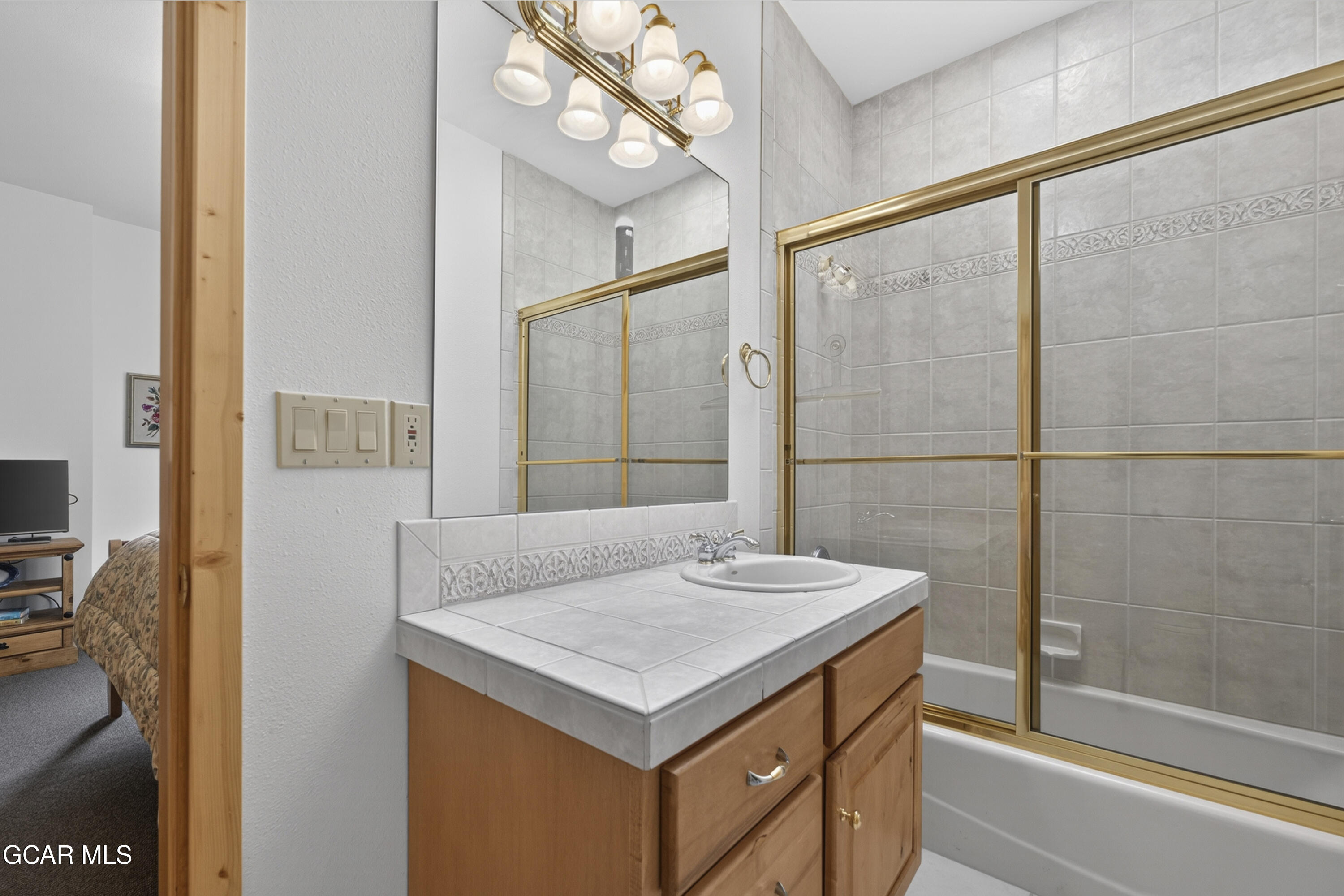 400 Ridge Road Tabernash, CO 80478 - Photo 31 of 50 a bathroom with a sink and a mirror