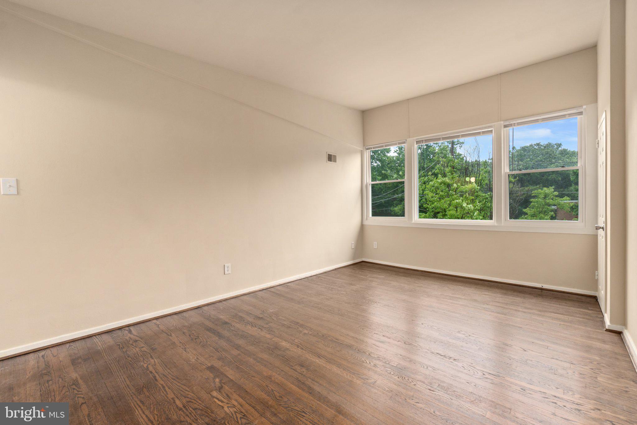 1029 Quebec Terrace, Unit 8 Silver Spring, MD 20903 - Photo 1 of 21 Bright and airy space with nature views.