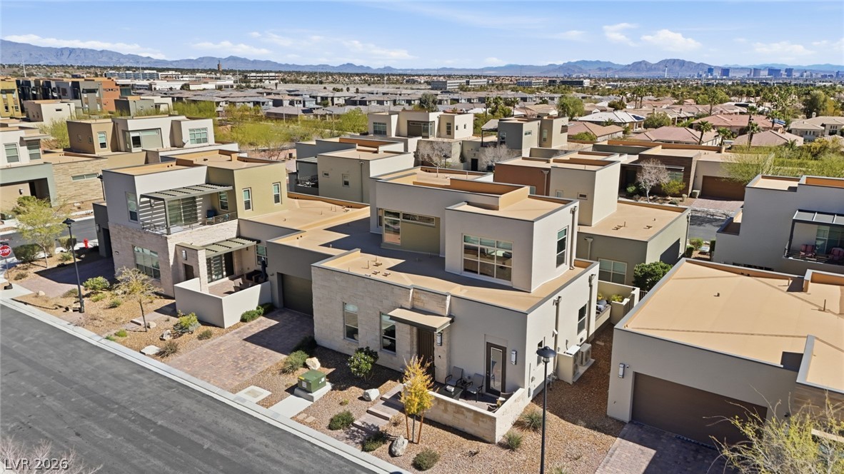 4246 Swift Street Las Vegas, NV 89135 - Photo 58 of 71 Aerial view of residential area featuring a mountainous background