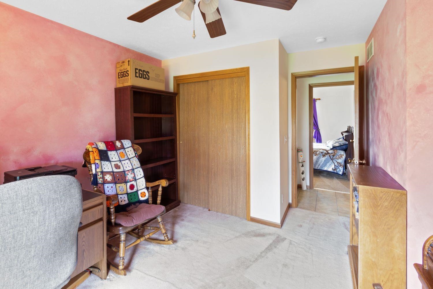 6771 Friday Road Byron, IL 61010 - Photo 18 of 25 a bedroom with furniture and a window