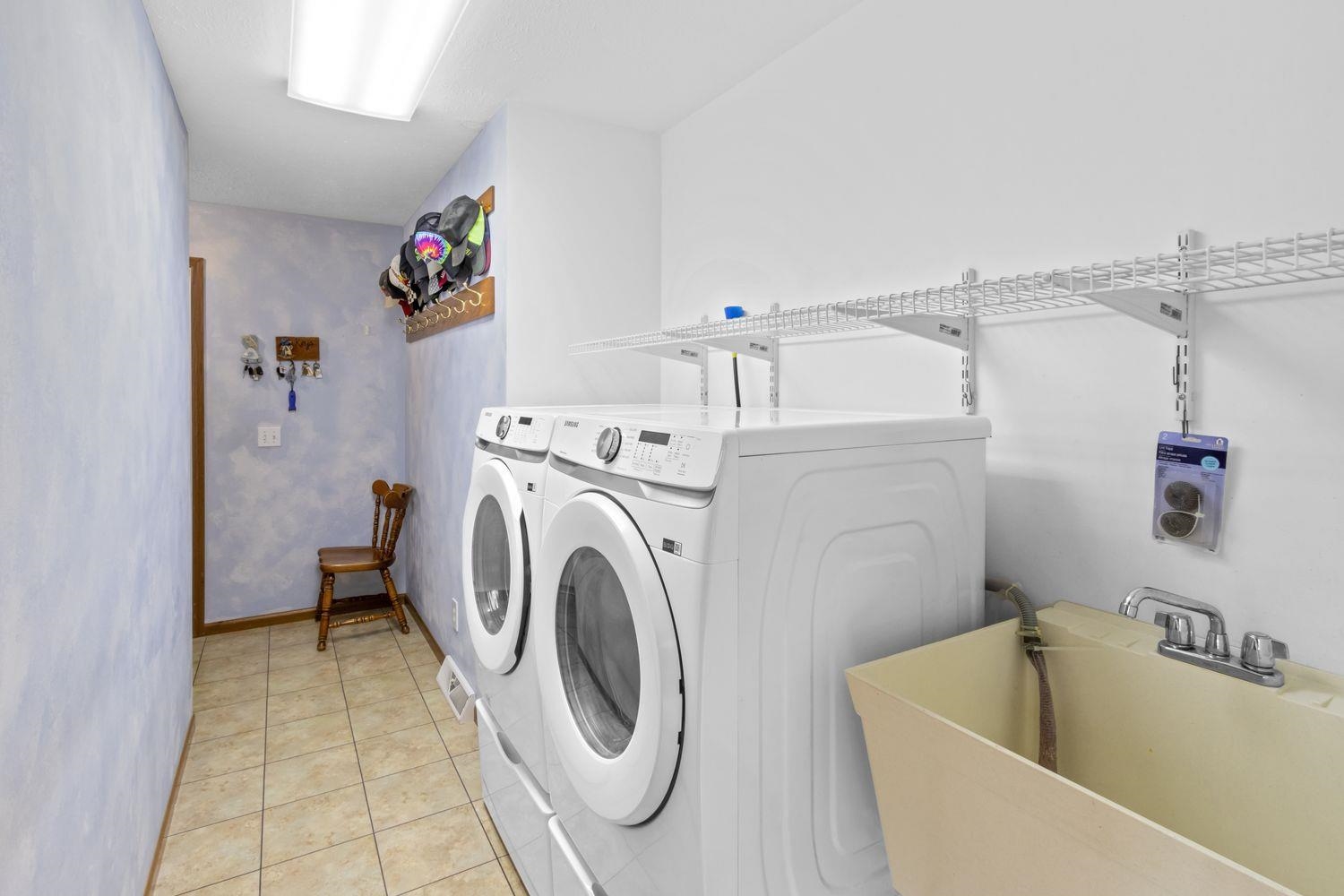 6771 Friday Road Byron, IL 61010 - Photo 24 of 25 a utility room with dryer and washer