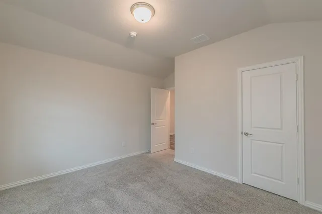 an empty room with an entryway