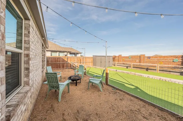 a view of a terrace with chairs