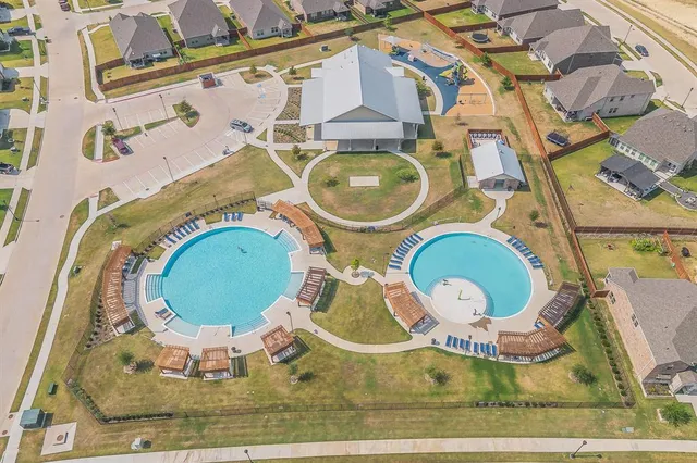 an aerial view of a swimming pool