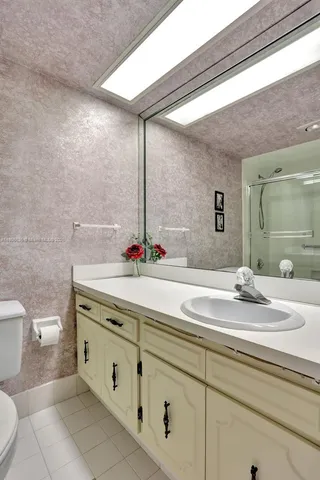 a view of a living room and floor to ceiling window