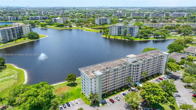 a view of a lake with a building in the background