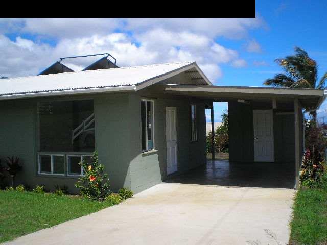 33 Maha Road, Unit 4 Makawao, HI 96768 - Photo 1 of 4 a front view of a house with a garden