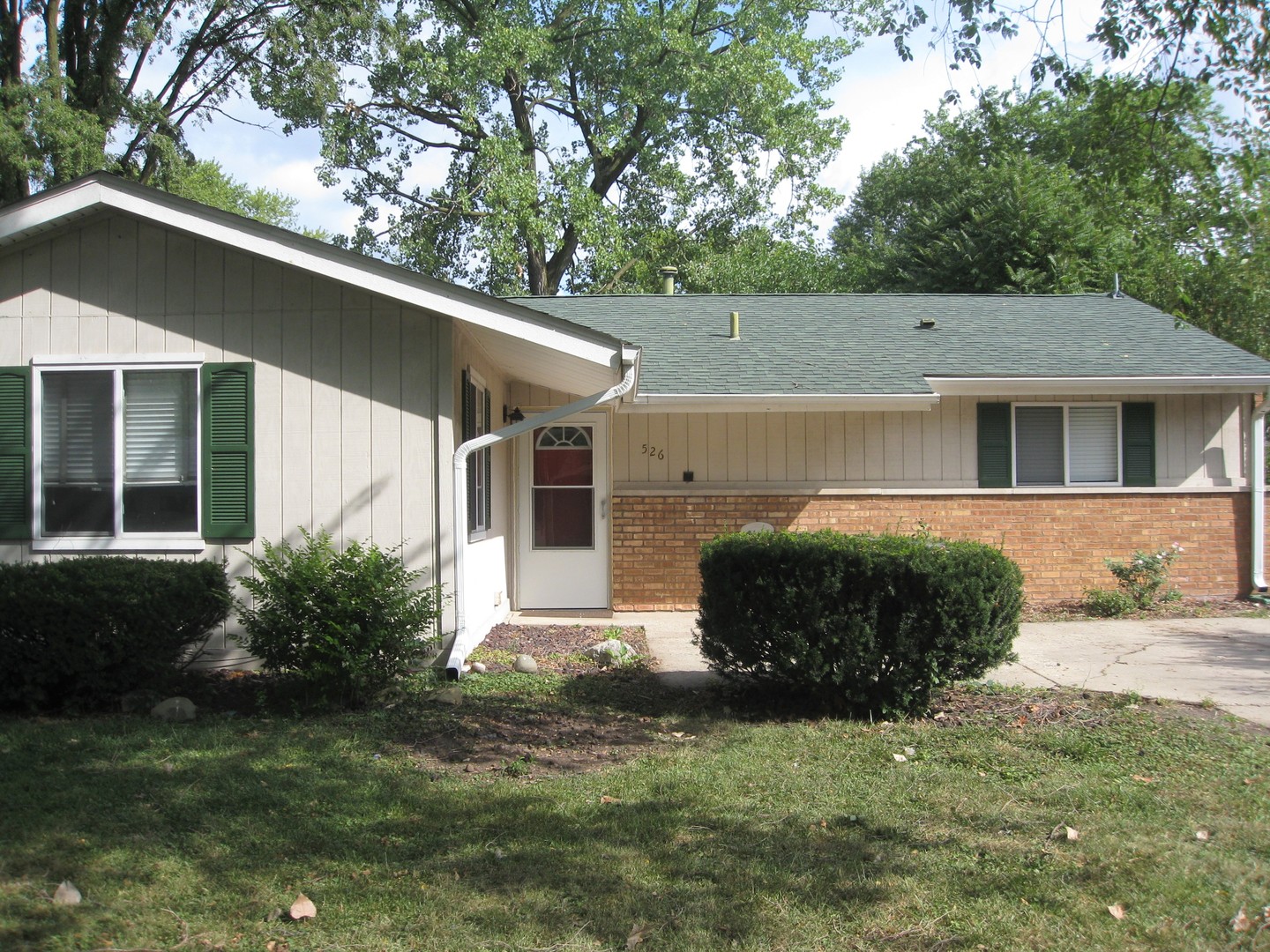 526 Spruce Road Bolingbrook, IL 60440 - Photo 1 of 13 a house that has a tree in front of it