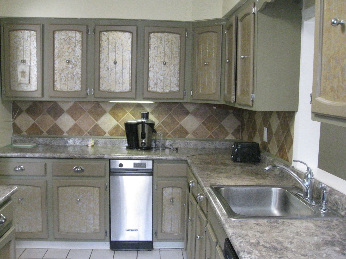 526 Spruce Road Bolingbrook, IL 60440 - Photo 3 of 13 a kitchen with granite countertop a sink a stove and cabinets