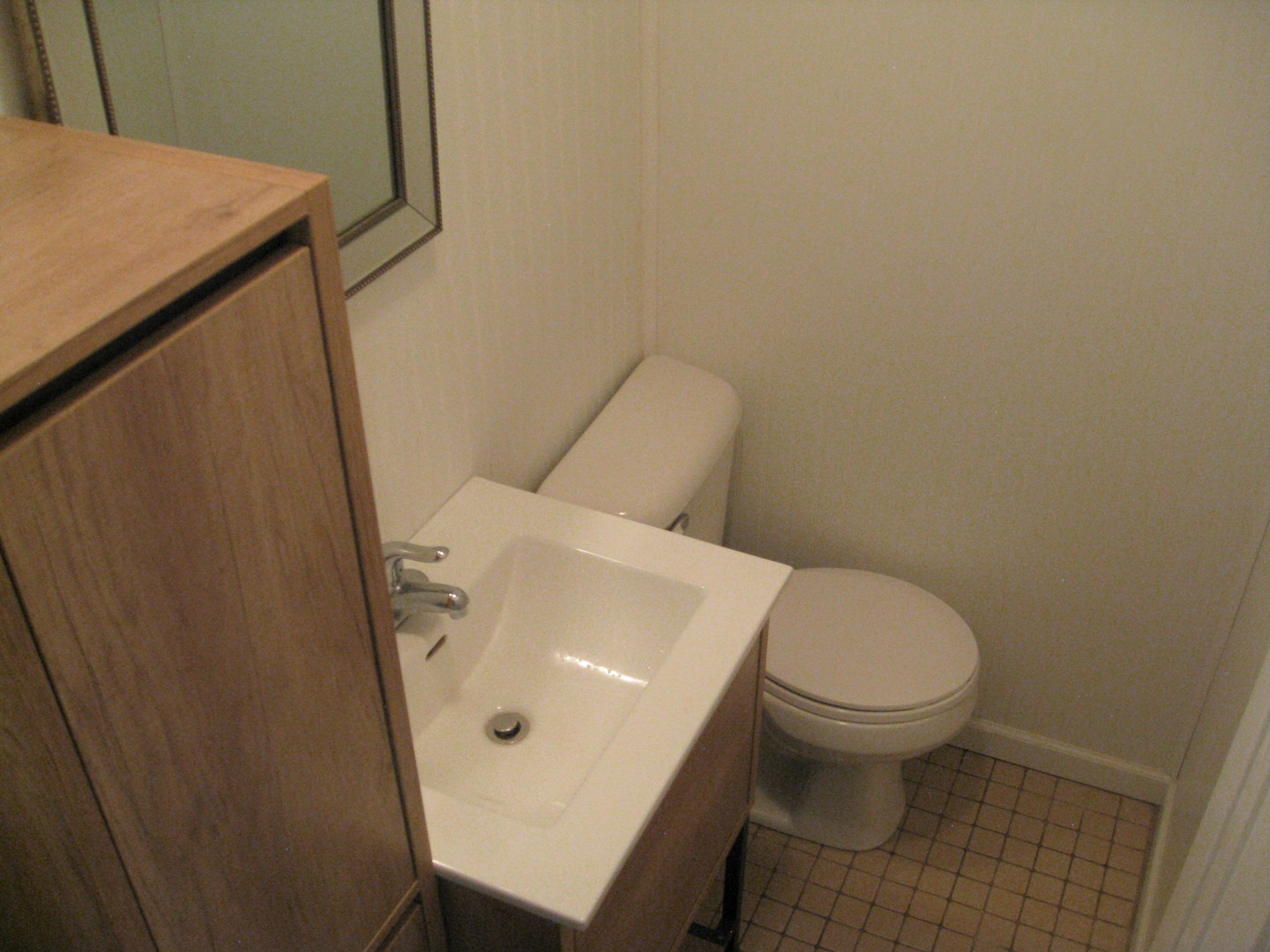 526 Spruce Road Bolingbrook, IL 60440 - Photo 6 of 13 a white toilet sitting next to a sink