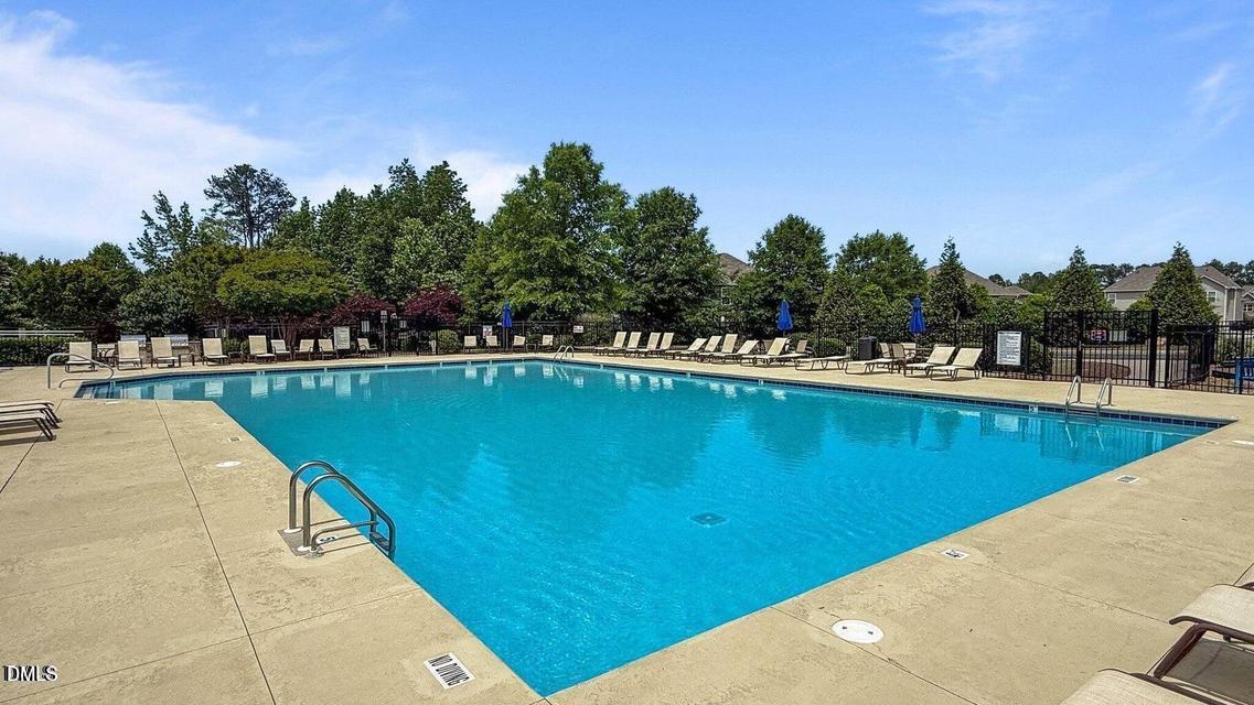 1808 Austin Rdg Parkway Wake Forest, NC 27587 - Photo 50 of 57 a view of a swimming pool with an outdoor seating
