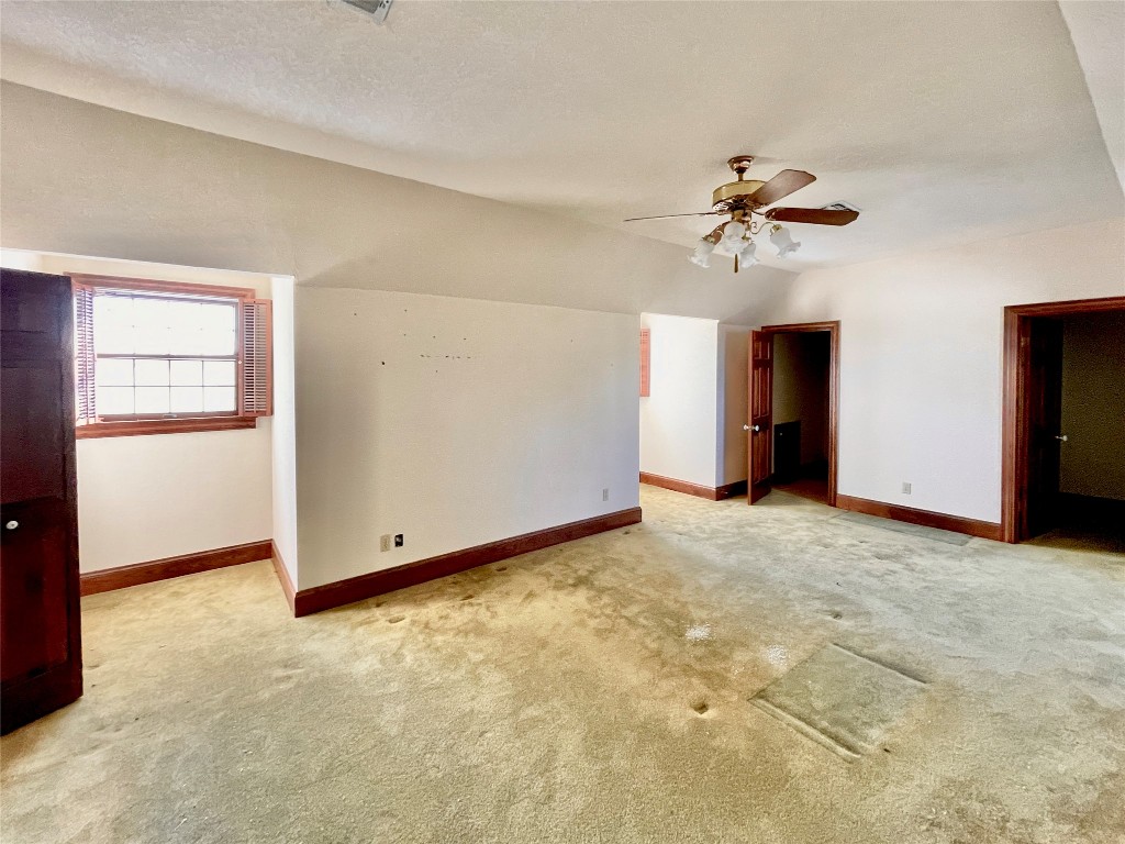 2 Sentinel Hill Austin, TX 78737 - Photo 22 of 40 a view of empty room with windows