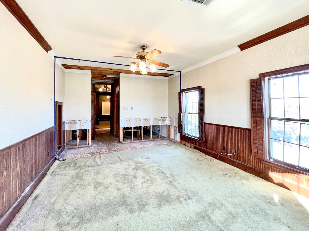 2 Sentinel Hill Austin, TX 78737 - Photo 32 of 40 wooden floor with chandelier and fireplace