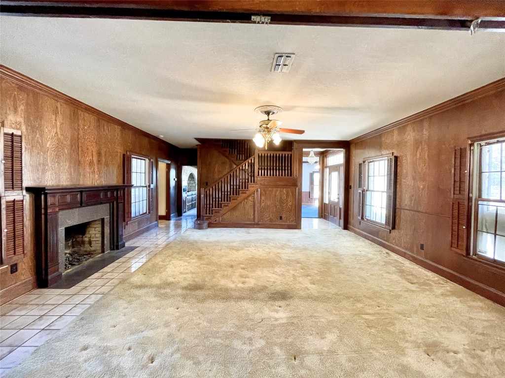 2 Sentinel Hill Austin, TX 78737 - Photo 36 of 40 a view of an empty room with window and fireplace