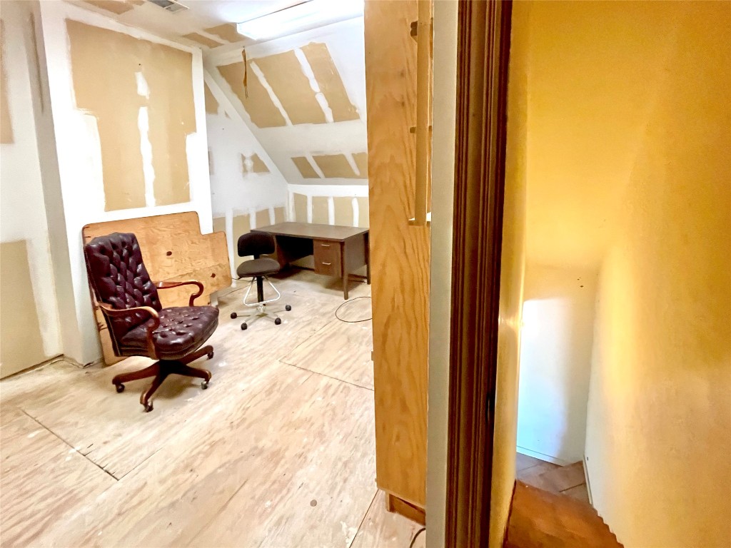 2 Sentinel Hill Austin, TX 78737 - Photo 10 of 40 a view of a bedroom with a window and furniture