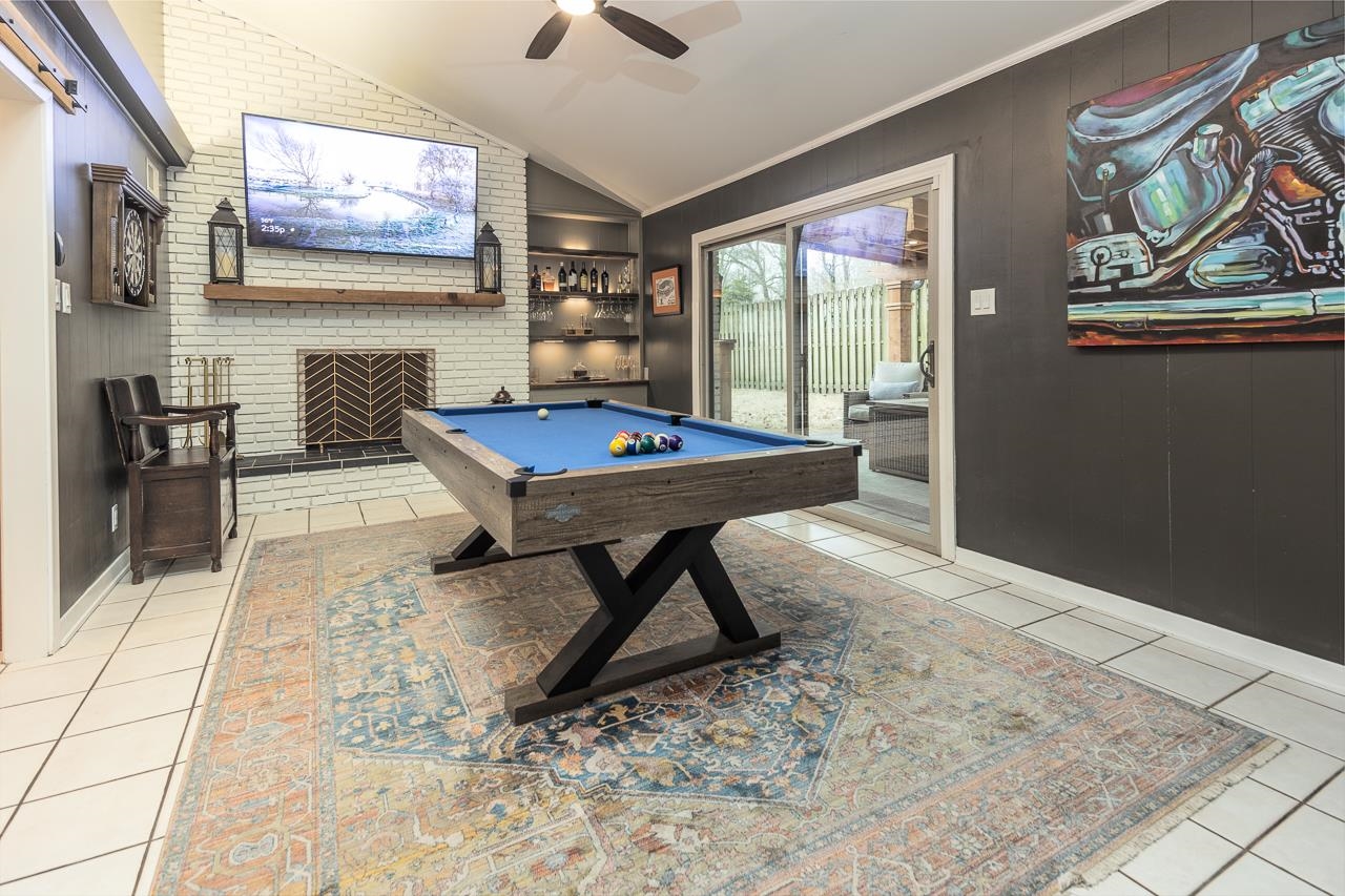 5641 Normandy Road Memphis, TN 38120 - Photo 12 of 25 a outdoor living space with furniture