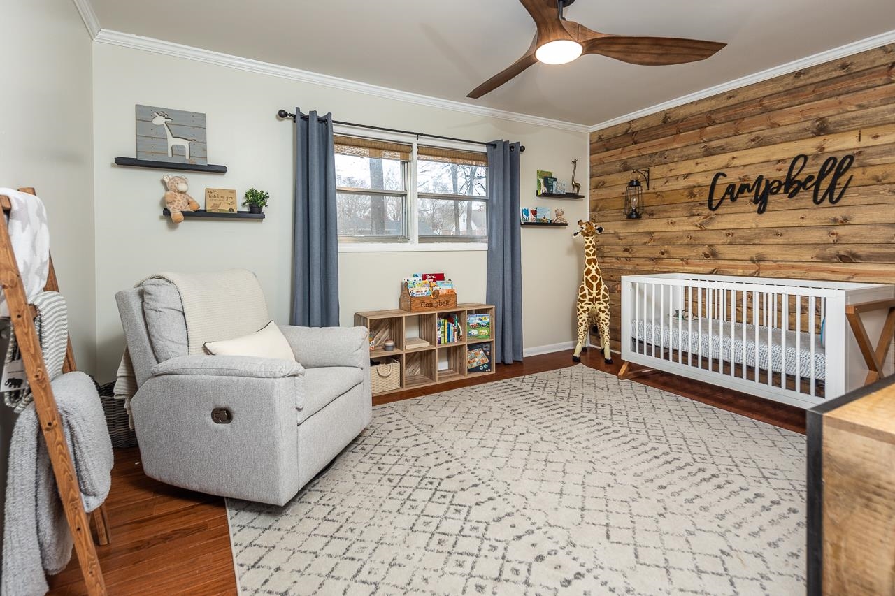 5641 Normandy Road Memphis, TN 38120 - Photo 17 of 25 a room with furniture and a window