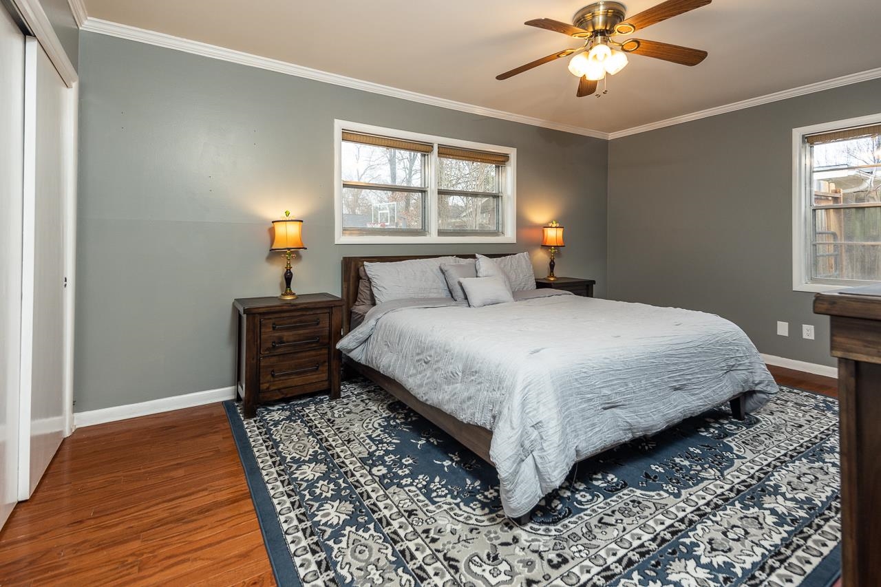 5641 Normandy Road Memphis, TN 38120 - Photo 18 of 25 a bedroom with a bed and a window