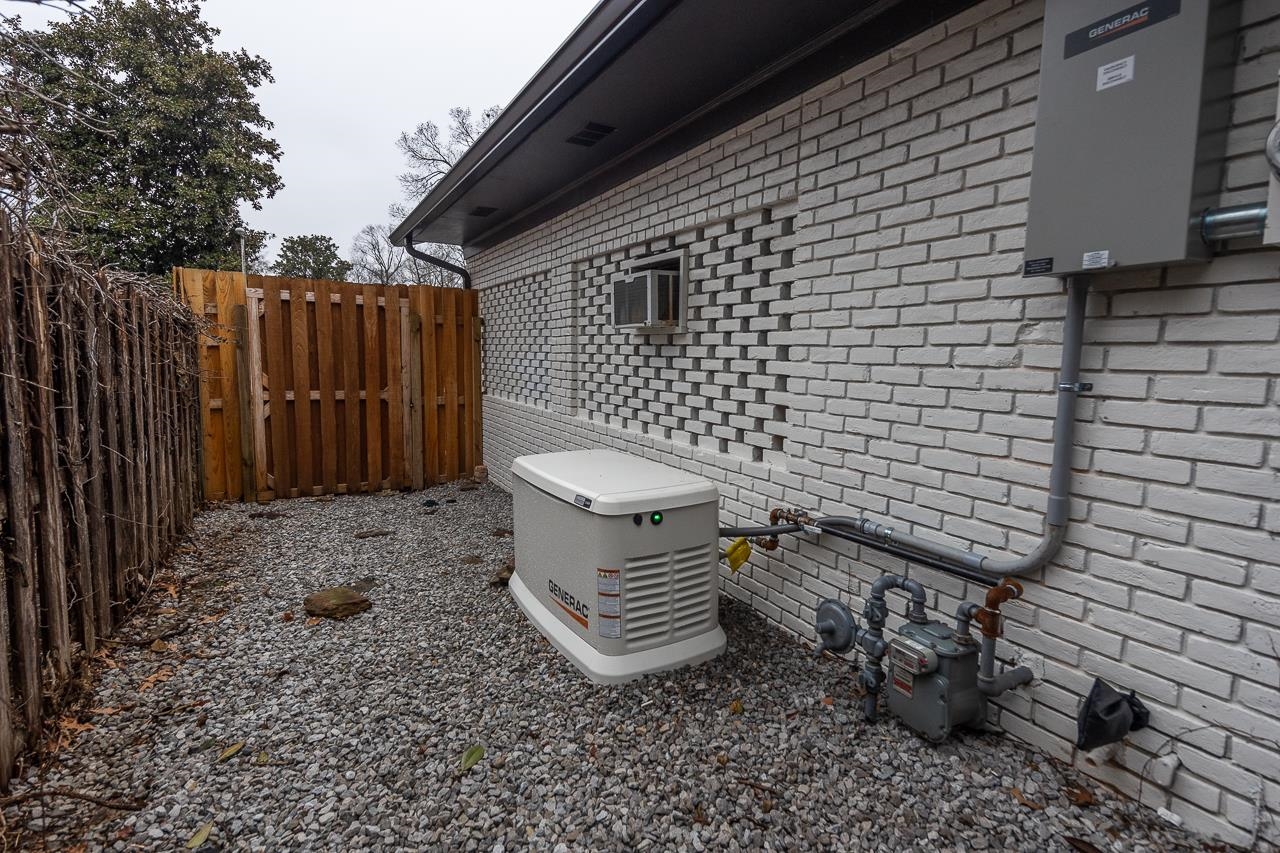 5641 Normandy Road Memphis, TN 38120 - Photo 24 of 25 a view of a backyard with wooden fence