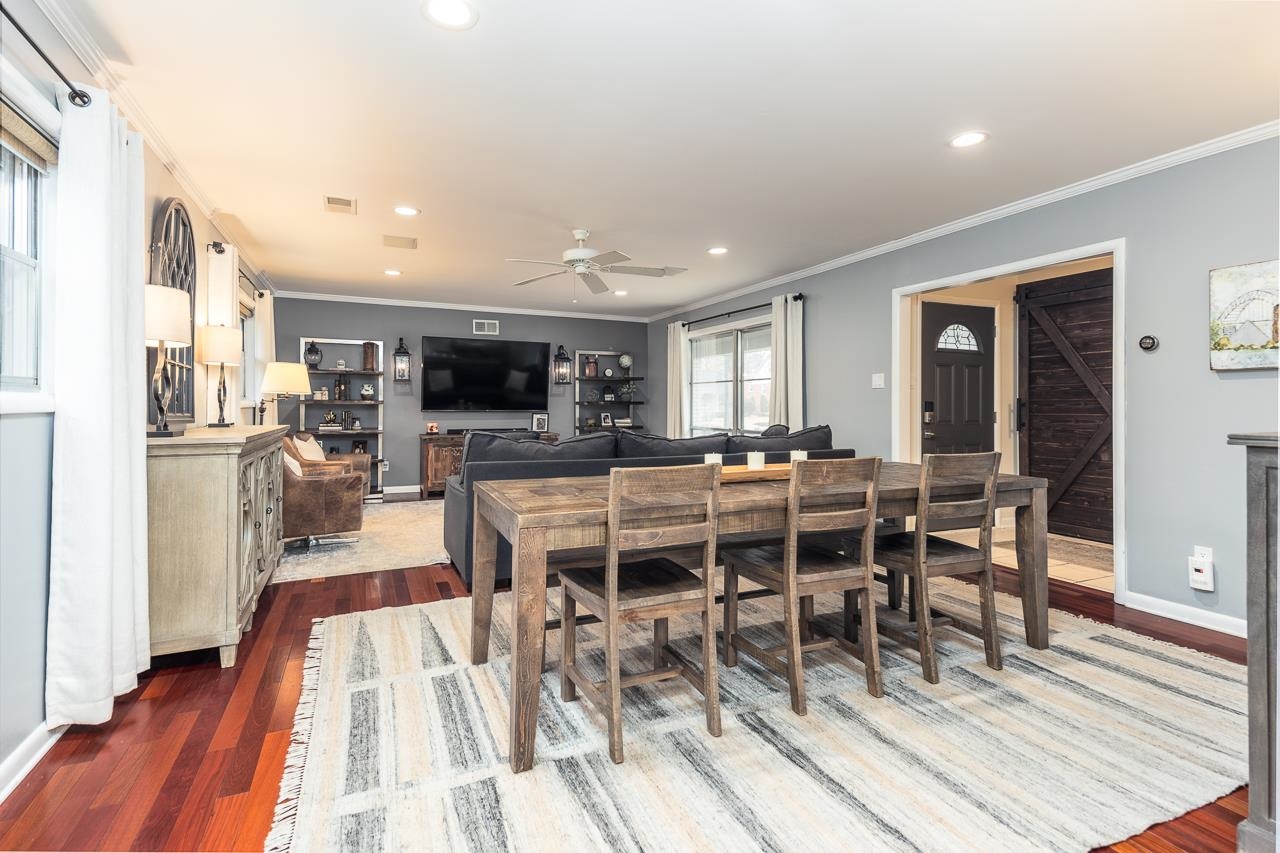 5641 Normandy Road Memphis, TN 38120 - Photo 7 of 25 a view of a dining room with furniture window and wooden floor